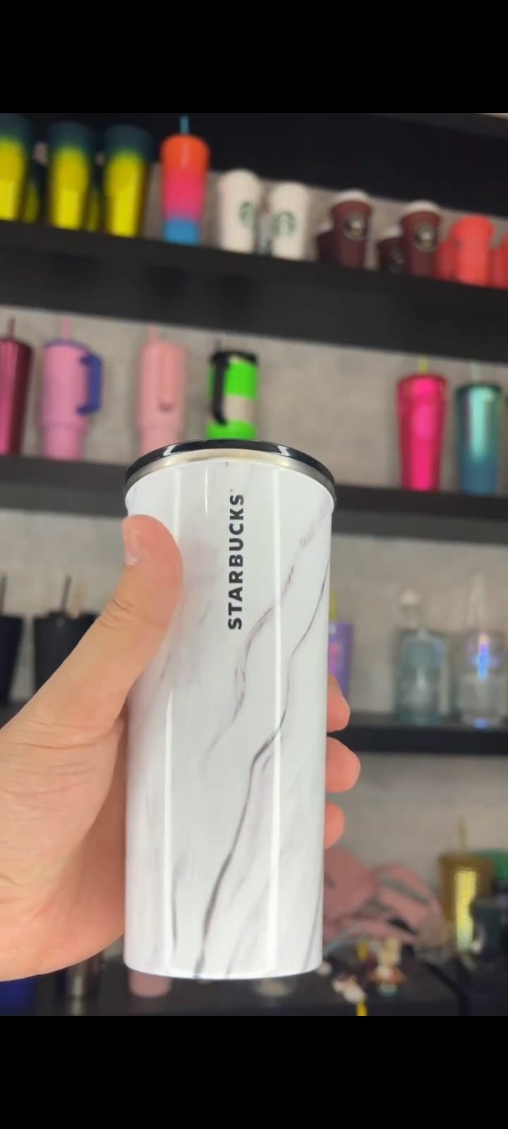 white tumbler from Starbucks (stainless)